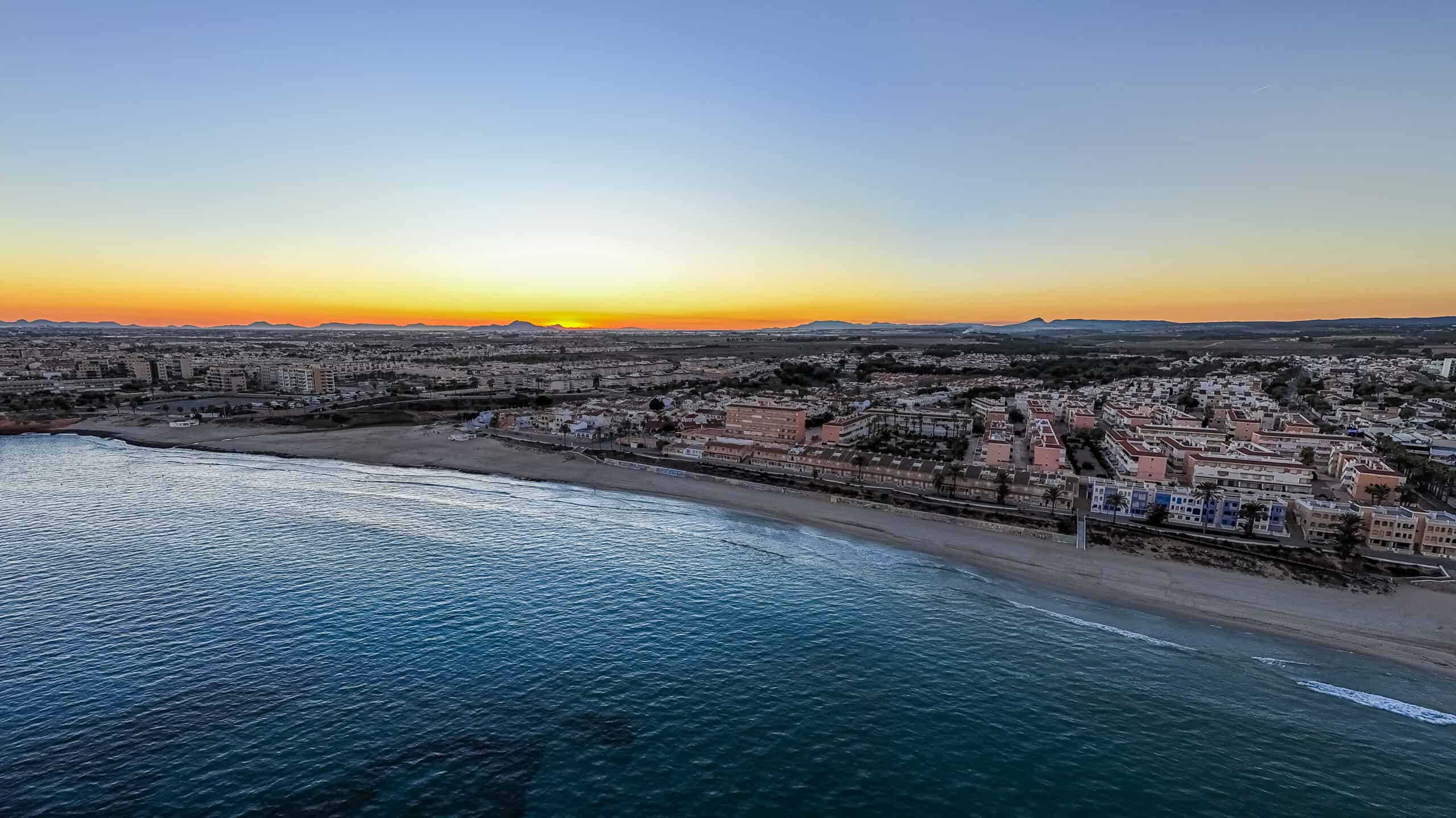 Panoramic aerial view of Mil Palmeras beach in Pilar de la Horadada at sunset